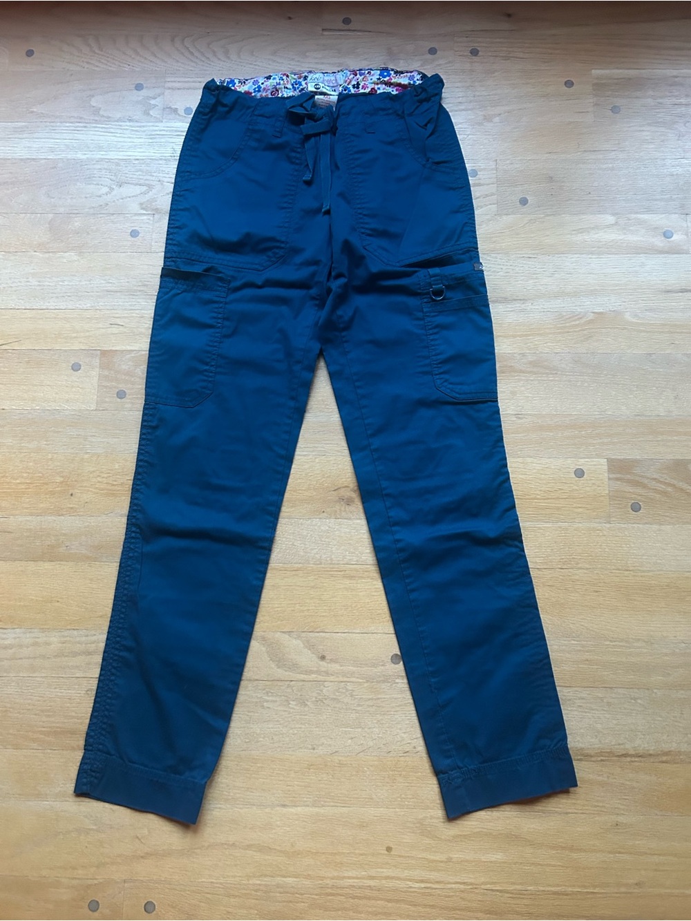 koi Navy Blue Cargo Scrub Pants with Floral Waist Lining